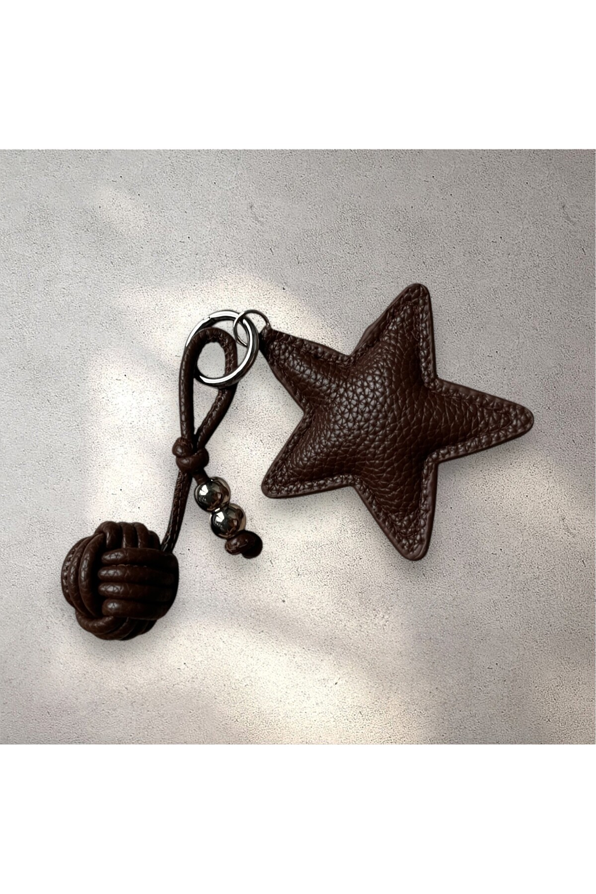 BROWN STAR BAG CHARM